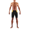 Skins Functional Pants TRI Brand Half Tight Short (for Triathlon, tight-fitting, quick-drying) black/yellow Men